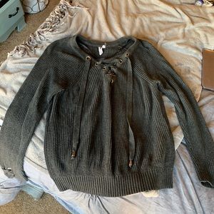 Cable & gauge lace up sweater